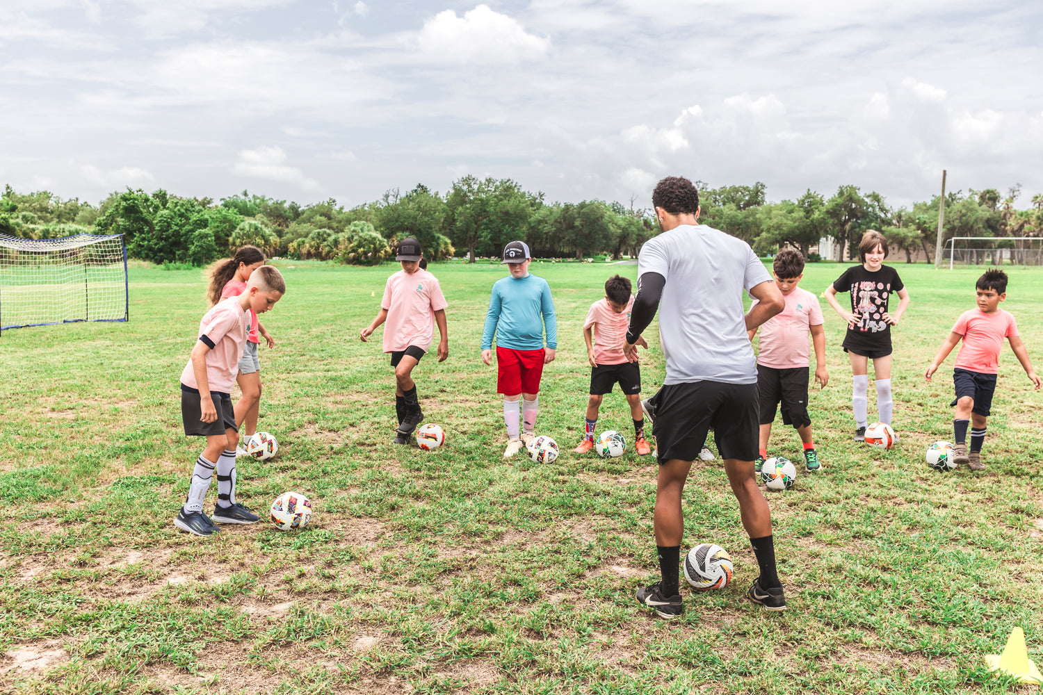 Kids participating in FC Way Summer Soccer Camp in Port Charlotte, Florida
